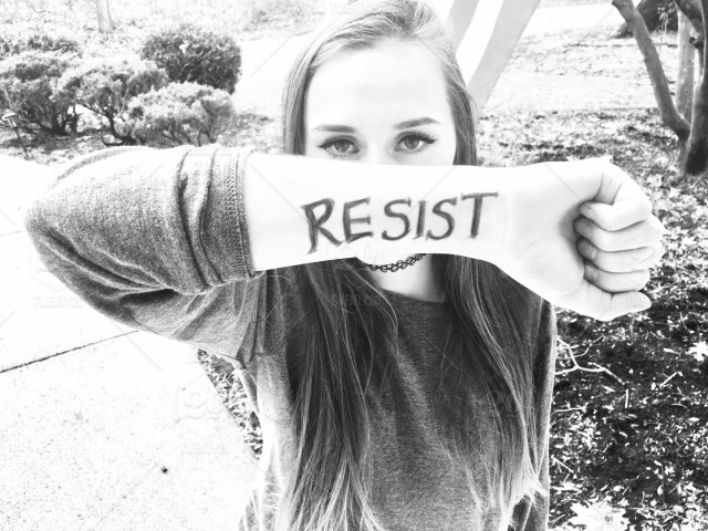stock-photo-women-black-and-white-young-woman-woman-peaceful-protest-political-resistance-activism-191113bc-9124-43c4-8e60-dc62374c01d3